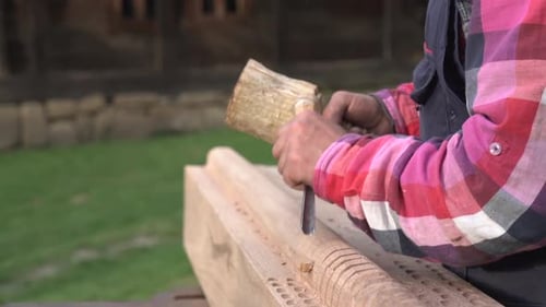 Craftsman Carving Intricate Wood Details With Hand Tools