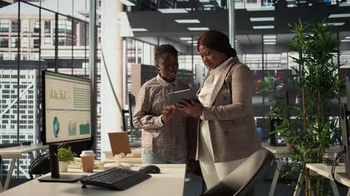 Women Working Together at an Office Desk