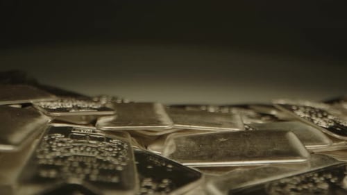 Silver Bullion Bars Stacked Close Up Slow Dolly