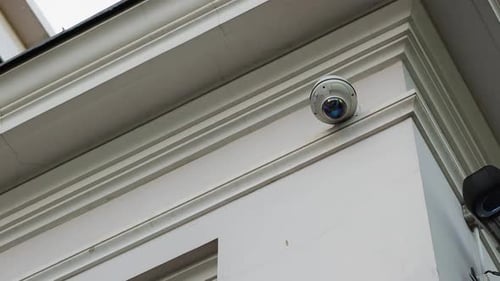 Building Protection CCTV Camera Safeguarding Wall in Daylight Hours
