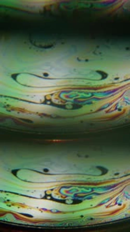 Abstract Liquid Animation with Rainbow Colors and Oil Spill