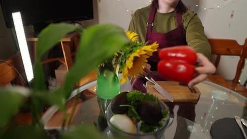 Red Pepper Being Prepared in Kitchen