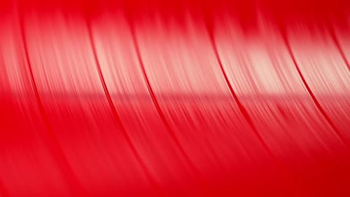 Macro Textured Grooves of Red Spinning Vinyl Record Music nostalgiaRetro Vibes