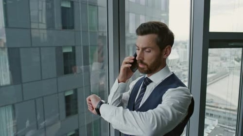 Businessman Making Appointment Phone Watching on Watch Close Up