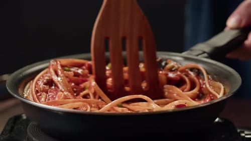 Close Up of Pasta Being Cooked in Pan