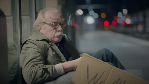 Elderly Homeless Man Suffering From Poverty Looking for Help at Train Station