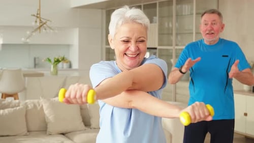 Senior Woman Exercising with Partner at Home