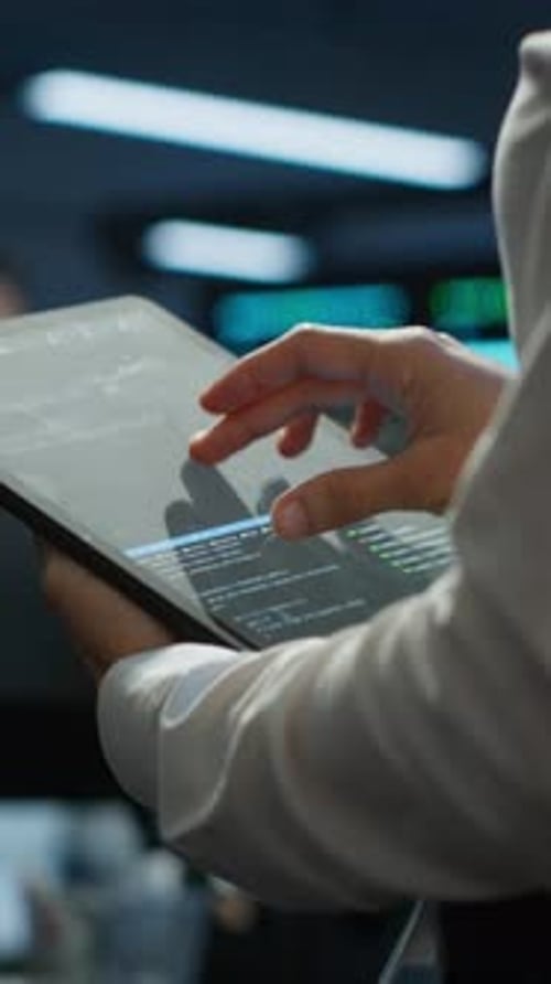 Vertical Video Engineer Working in Data Center Used for Managing Infrastructure Rigs