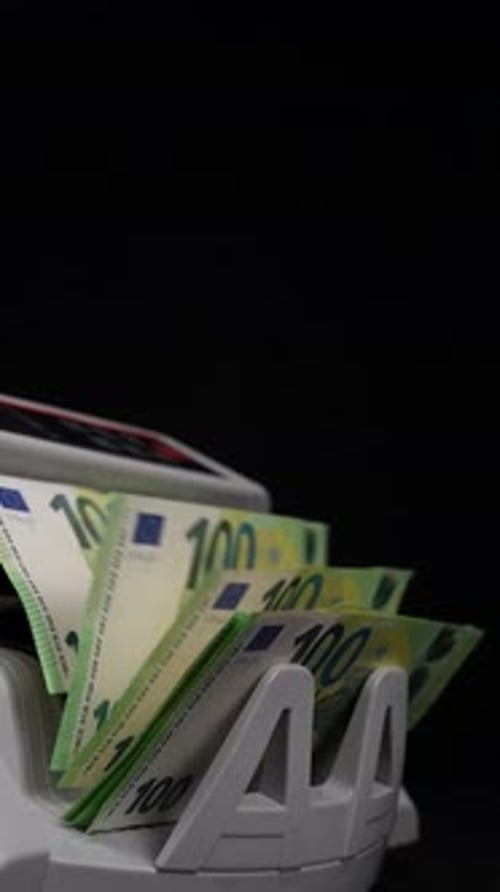 Money Counter Processing Stack of Euro Notes