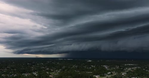 Tropical Thunderstorm Precipitation Falling Down on Florida Town Rain Shower in Summer