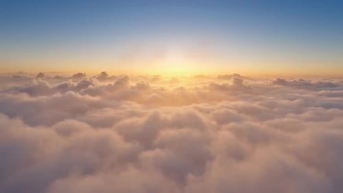 Flight Above Soft White Clouds