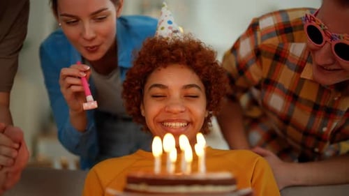 Friends Celebrating a Birthday Together at Home