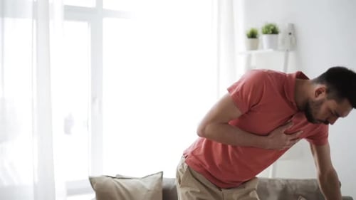 People, Healthcare and Problem Concept - Unhappy Man Suffering From Heart Ache