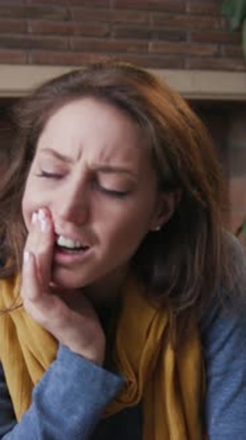 Woman Suffering from Toothache, Touching Face