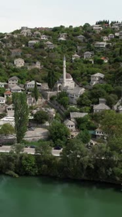 Aerial View of Hillside Village and River