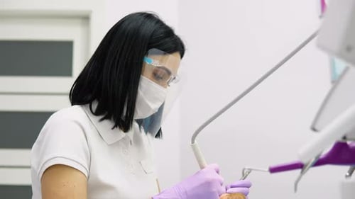 Dental Professional Working in Sterile Environment