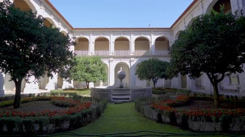 A cloister garden inside a Portuguese monastery, called 'Santa Mafalda de Arouca Monastery,' featuri