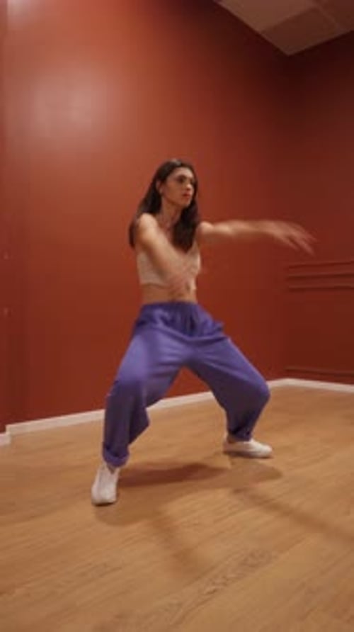 Young Woman Dancing Indoors