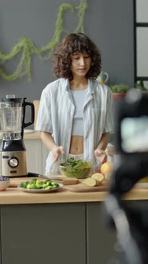 Young Adult Woman Prepares Healthy Smoothie Ingredients
