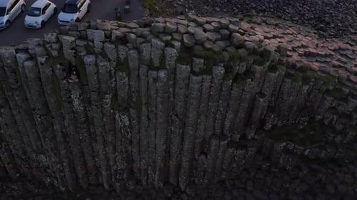 Aerial Top-Down View of Basalt Columns at Giant's Causeway with Sunset Reveal