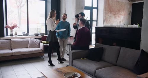 Wide Shot Group of Young Millennial Business Coworkers Chatting at Modern Trendy Loft Light Office