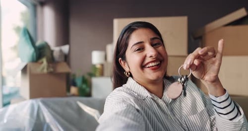 New home, video call and woman with keys, boxes and showing with real estate