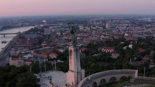 4K Aerial footage of the Liberty statue Landmark in Budapest, Hungary at dawn