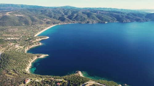 Mediterranean Coastal Aerial 4k, Greece Nature Panorama. Mountain Coast And Blue Sea Background