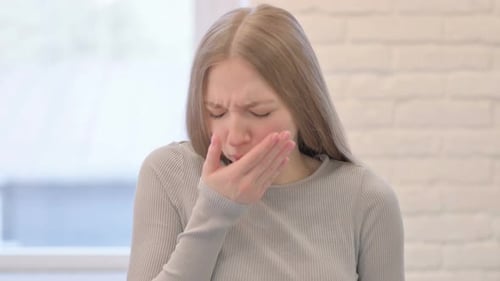 Woman Coughing from Illness, Close Up Studio Shot