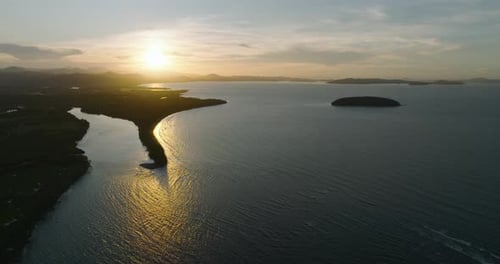 Eagle's Eye View of Tropical Island with Sunset