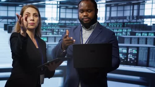 Teamworking Colleagues Doing Checkup in Data Center
