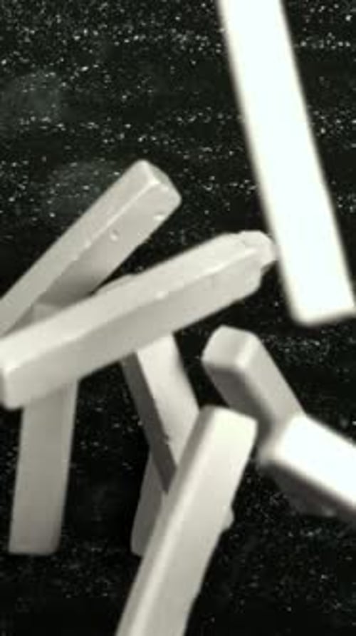 Chalk Falls on the Blackboard Filmed on a Highspeed Camera at 1000 Fps