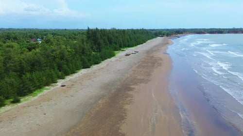Aerial view from drone in bengkulu, indonesia showing turquoise indian waters