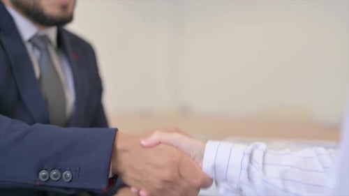 Close Up of Business People Shaking Hand