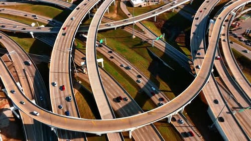 Transport moving by the road interchange. Highways and freeways in the modern city. Top view.