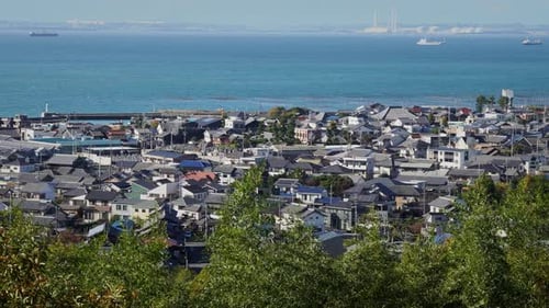 Japan in Motion: Panning Across The Coastal City of Tokoname