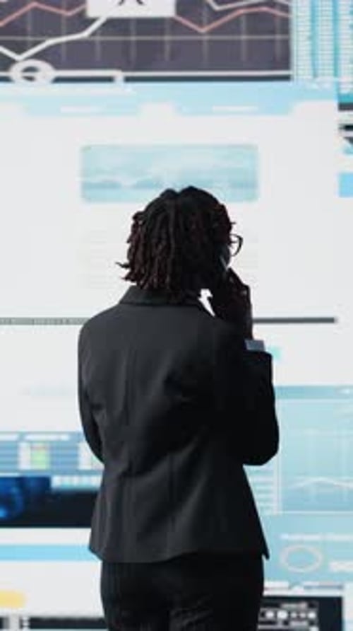 Vertical Video Business Specialist Doing Strategy Planning Over Telephone Call
