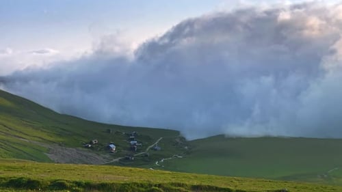 Time Lapse Of Clouds Shrouding Mountain Plateau With Village And Pastures, Tkhilvana village, Adjara
