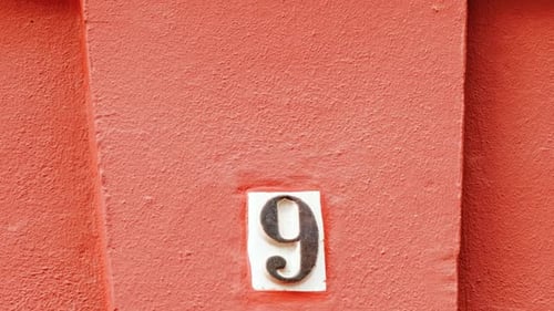 Number 9 (nine) Affixed to a Building