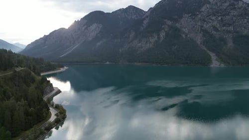 Lake in Tyrol Austria morning rising drone view