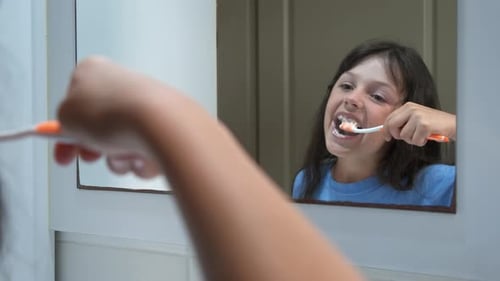 Cute Child Brushes His Teeth