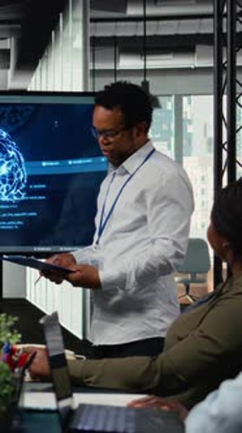Vertical Video CTO in Startup Office Doing Presentation on Deep Learning Tech to Investors