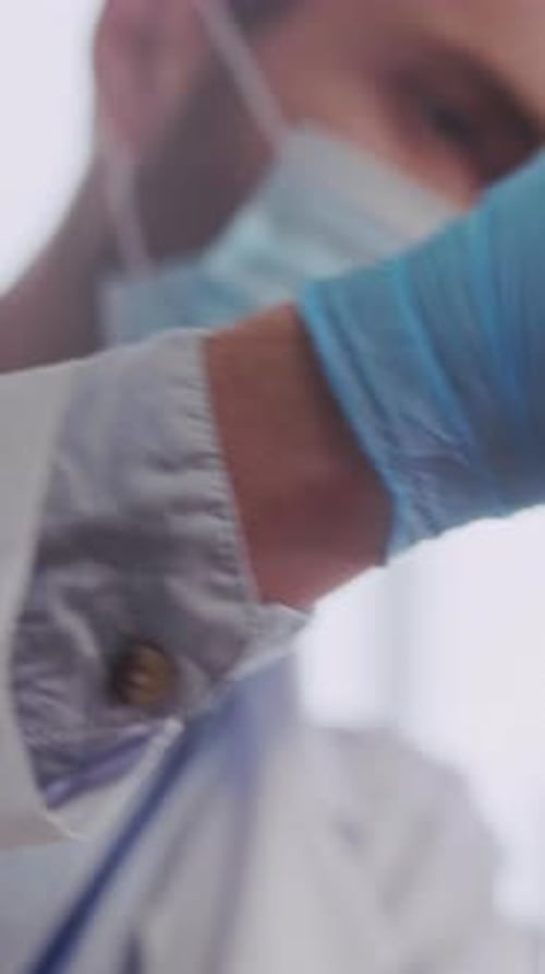 Healthcare Worker Administers Injection to Patient in Arm