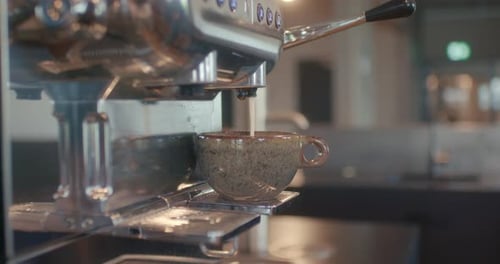 Close up of the preparation of a cappuccino
