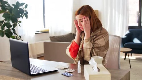 Sick Woman with Laptop Telemedicine Consultation at Home
