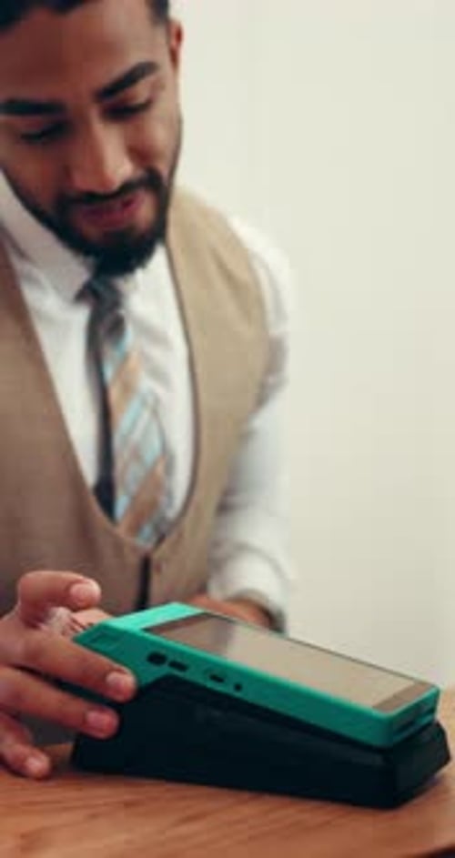 Man, hands and pos machine with credit card in hotel for wireless transaction, payment or stay