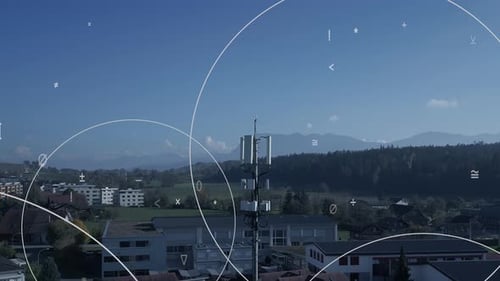 A Telecommunication Tower Surrounded By Vast Countryside and Scenic Views of Nature