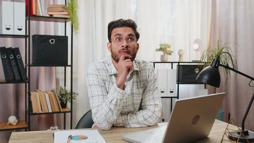 Indian Freelancer Prepares Startup Project for Presentation Finds Idea Using Laptop at Home Office