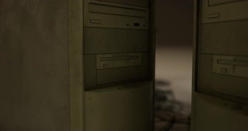 Retro Computer Towers with Power Strips and Wires