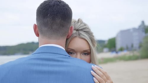 Couple Embracing on the Beach